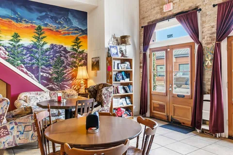 a view of a dining room with furniture