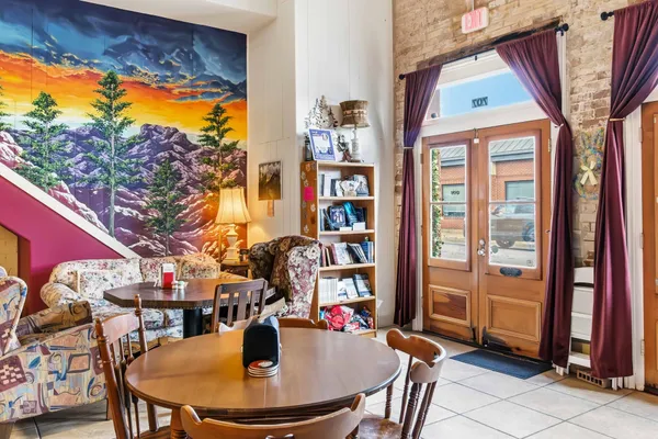 a view of a dining room with furniture
