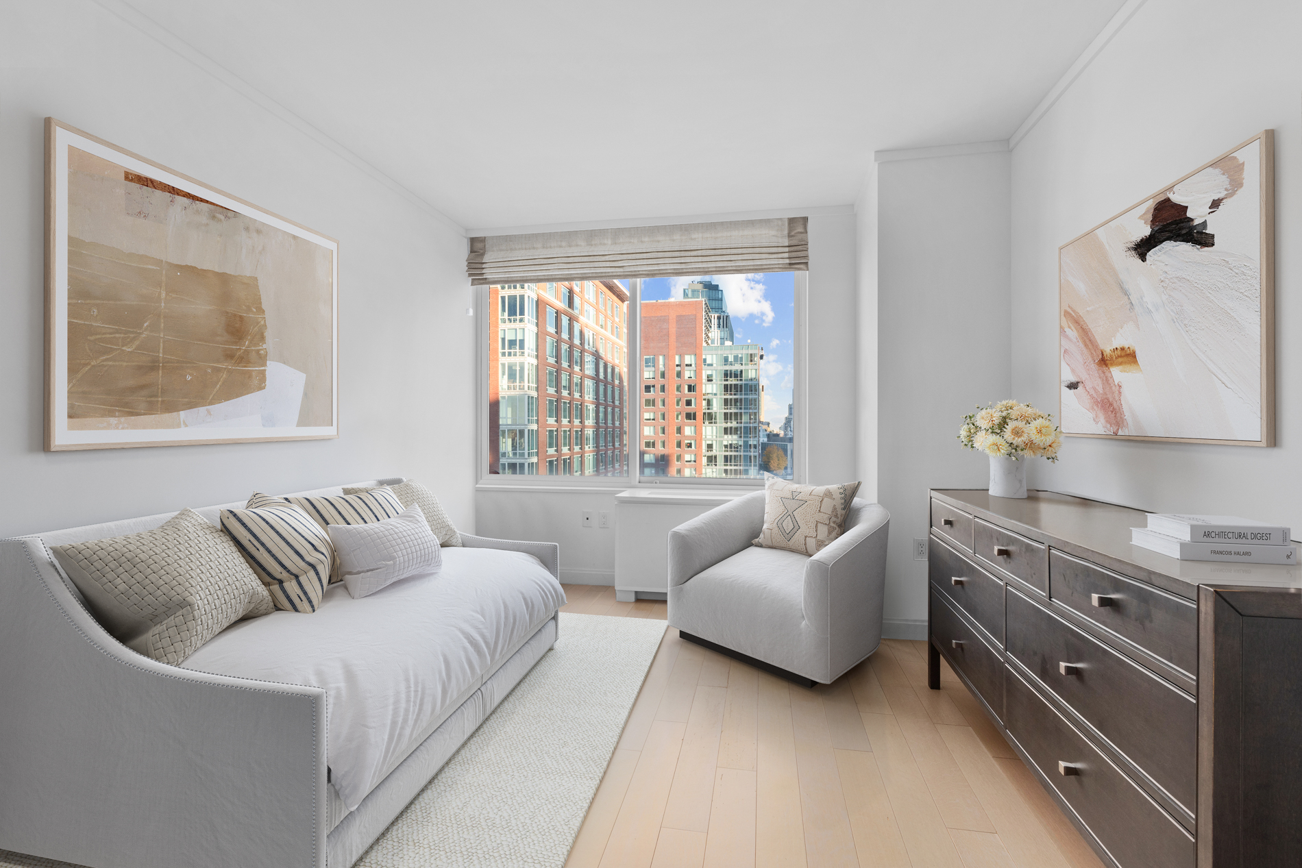 212 Warren Street, Unit 20A Manhattan, NY 10282 - Photo 18 of 23 a living room with furniture and a large window