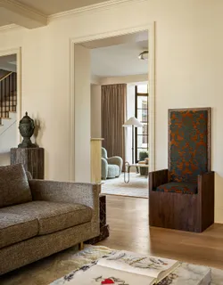 a living room with furniture and a couch