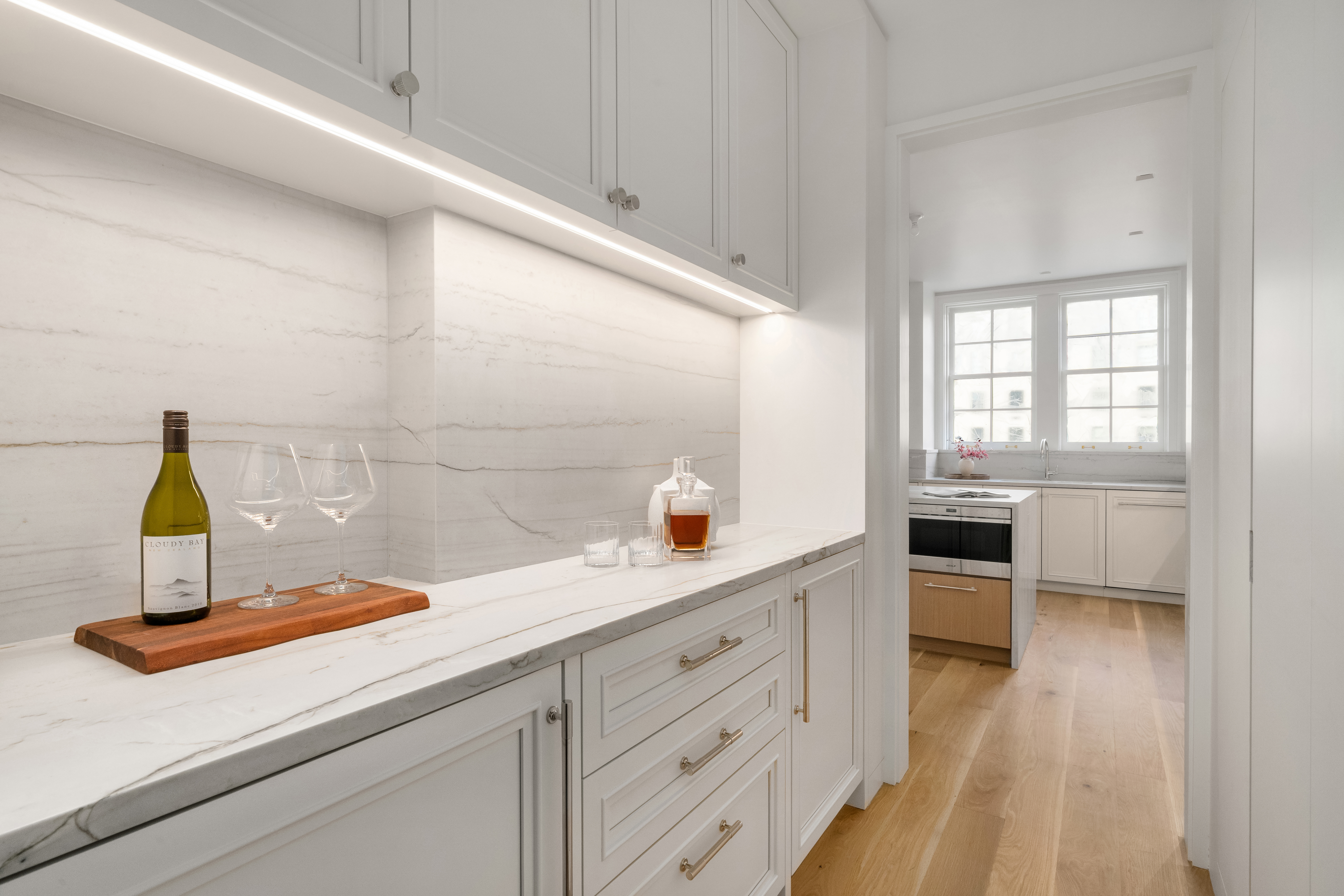 1020 5th Avenue, Unit 9 Manhattan, NY 10028 - Photo 13 of 27 a kitchen with a sink and cabinets