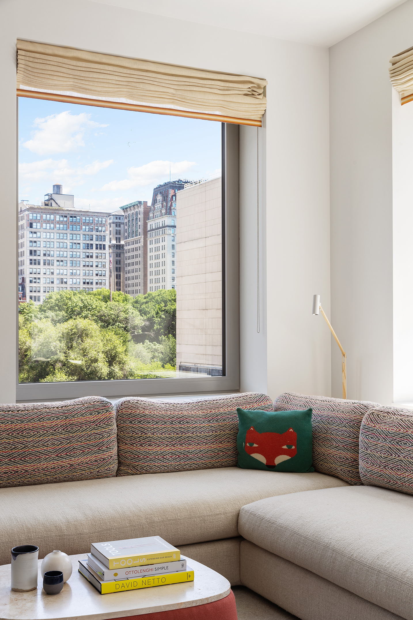 116 University Place, Unit 5 Manhattan, NY 10003 - Photo 4 of 19 a living room with a couch and a window