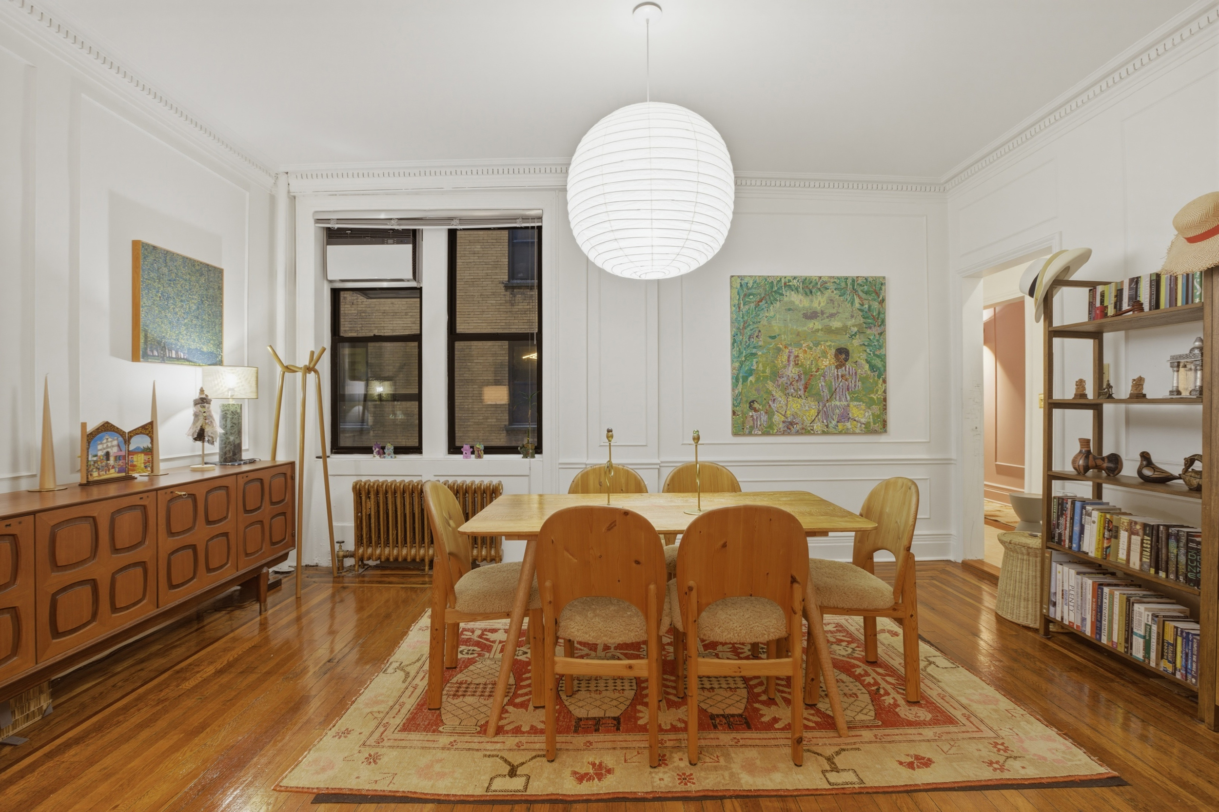 532 West 111th Street, Unit 26 Manhattan, NY 10025 - Photo 4 of 14 a view of a dining room with furniture window and wooden floor