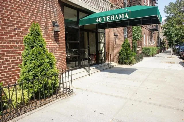 a view of a house with a street