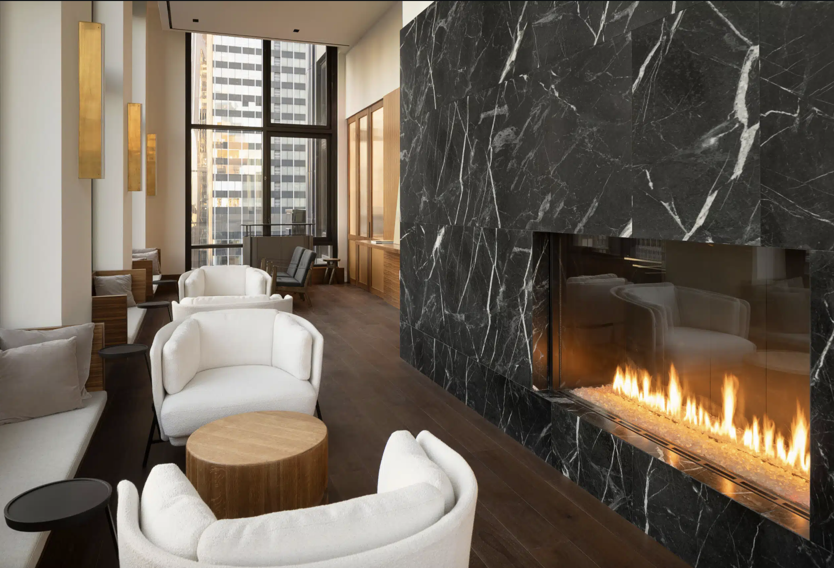 135 East 47th Street, Unit 12C Manhattan, NY 10017 - Photo 13 of 15 a living room with furniture and a large window