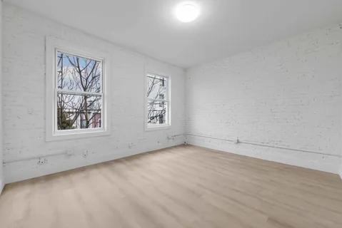 an empty room with windows