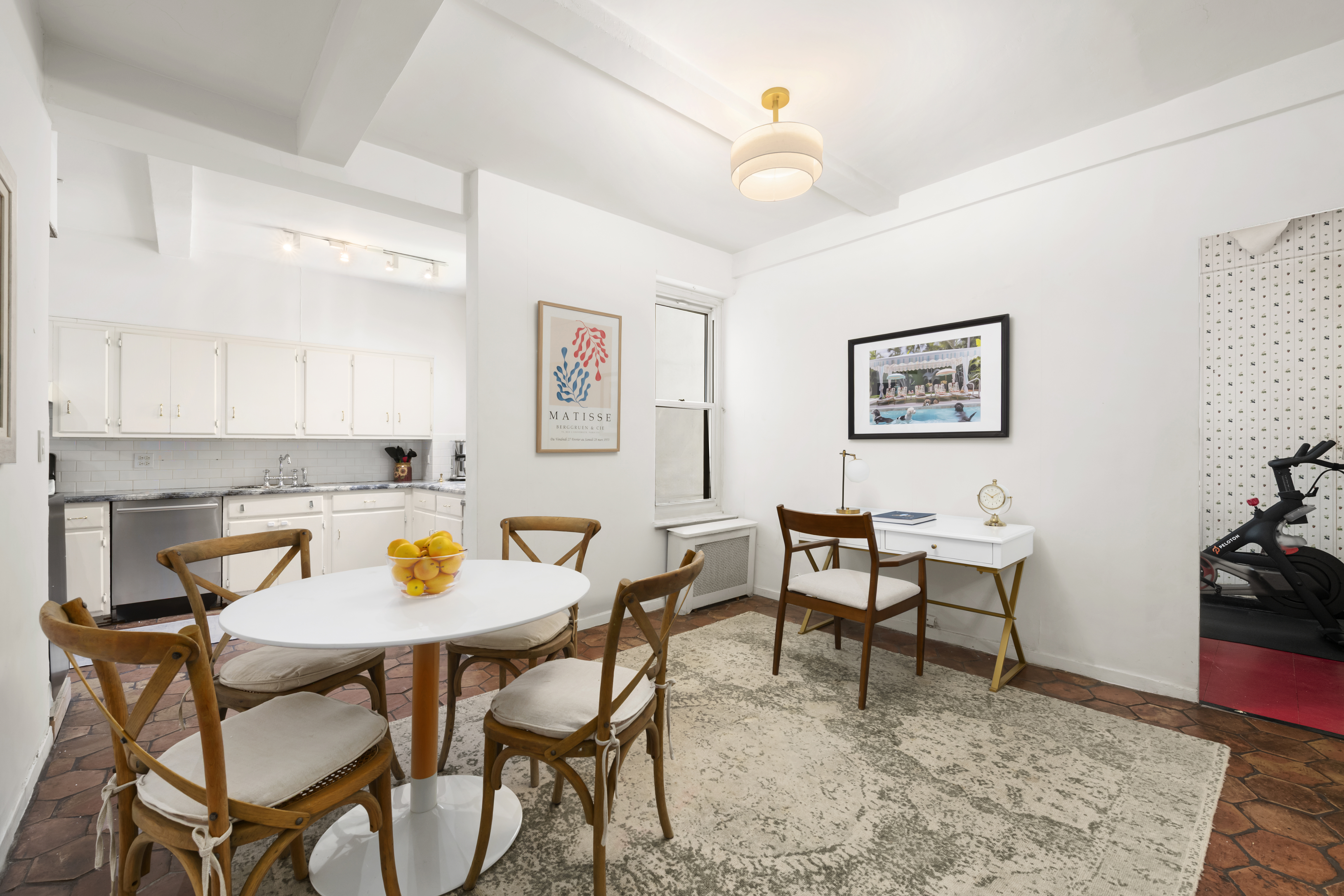 320 East 72nd Street, Unit 6A Manhattan, NY 10021 - Photo 10 of 13 a view of a dining room with furniture and wooden floor