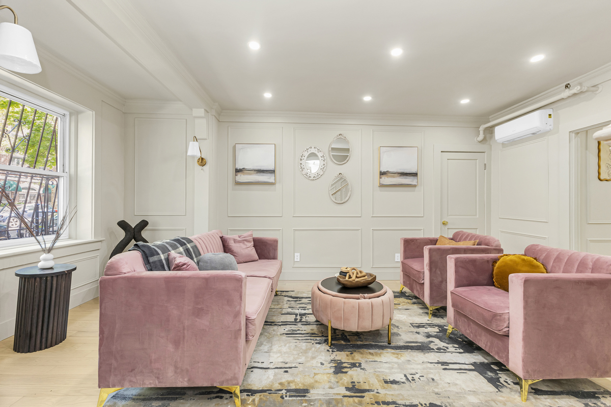1050 Sterling Place Brooklyn, NY 11213 - Photo 2 of 23 a living room with furniture and a potted plant