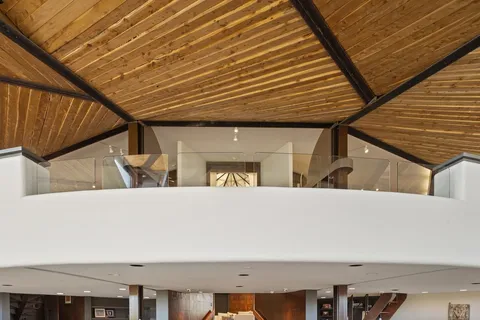 a view of a workspace with furniture