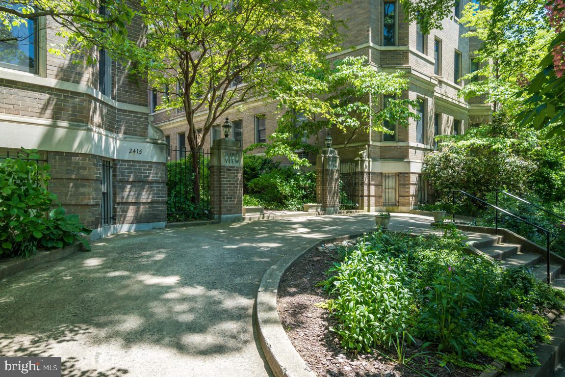 2415 20th Street Northwest, Unit 38 Washington, DC 20009 - Photo 27 of 30 front view of a house with a yard
