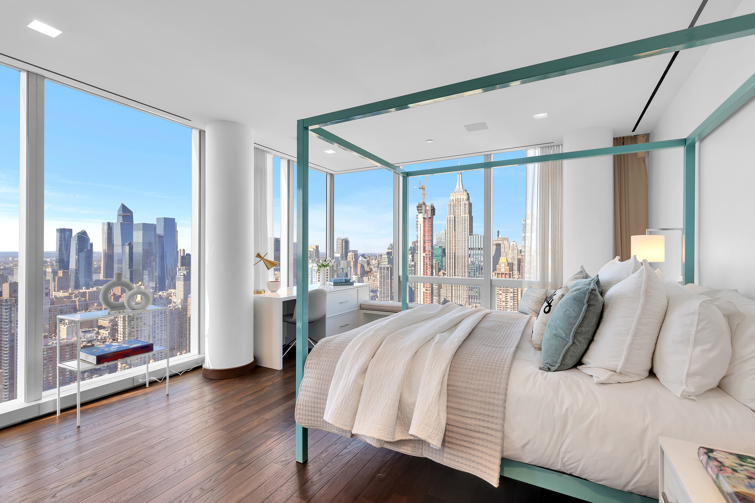 23 East 22nd Street, Unit PH Manhattan, NY 10010 - Photo 16 of 32 a bedroom with a large bed and a large window