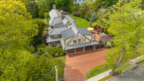 a aerial view of a house with swimming pool