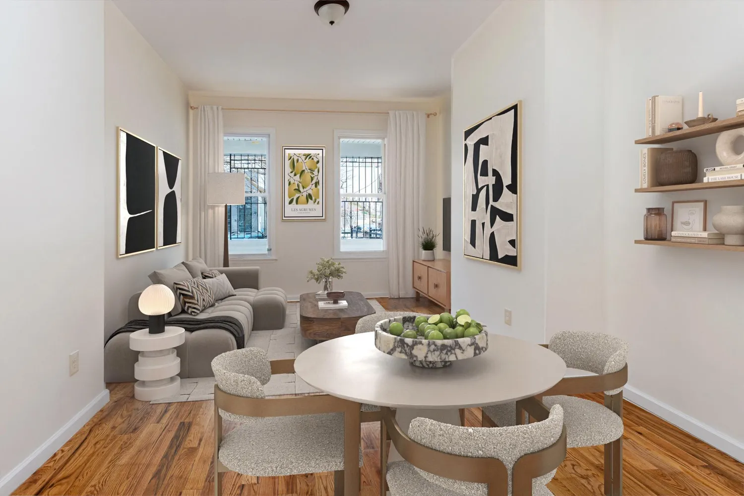 a view of a dining room with furniture and wooden floor