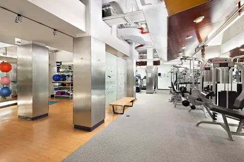a view of a room with gym equipment