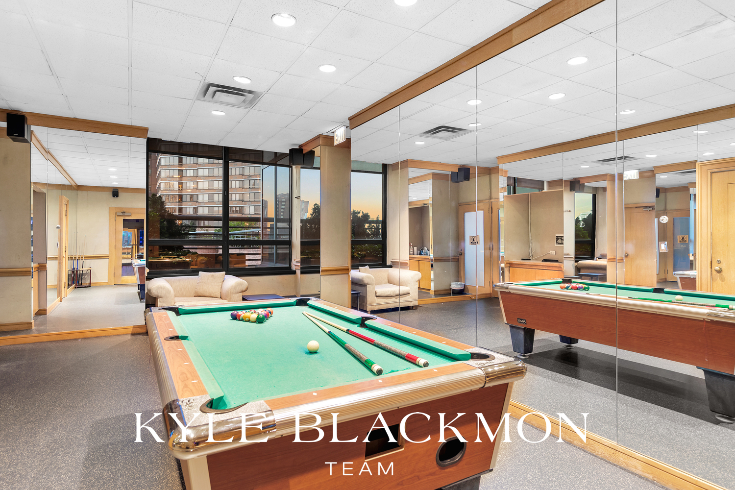 415 East 37th Street, Unit 9JK Manhattan, NY 10016 - Photo 23 of 28 a room with pool table and windows