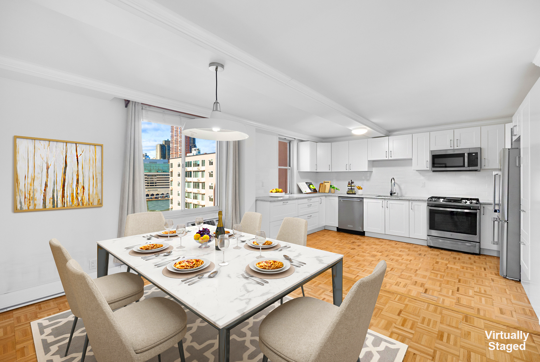 555 Main Street, Unit 1114 Manhattan, NY 10044 - Photo 1 of 9 a open kitchen with stainless steel appliances kitchen island granite countertop a stove a sink dishwasher a dining table and chairs with wooden floor