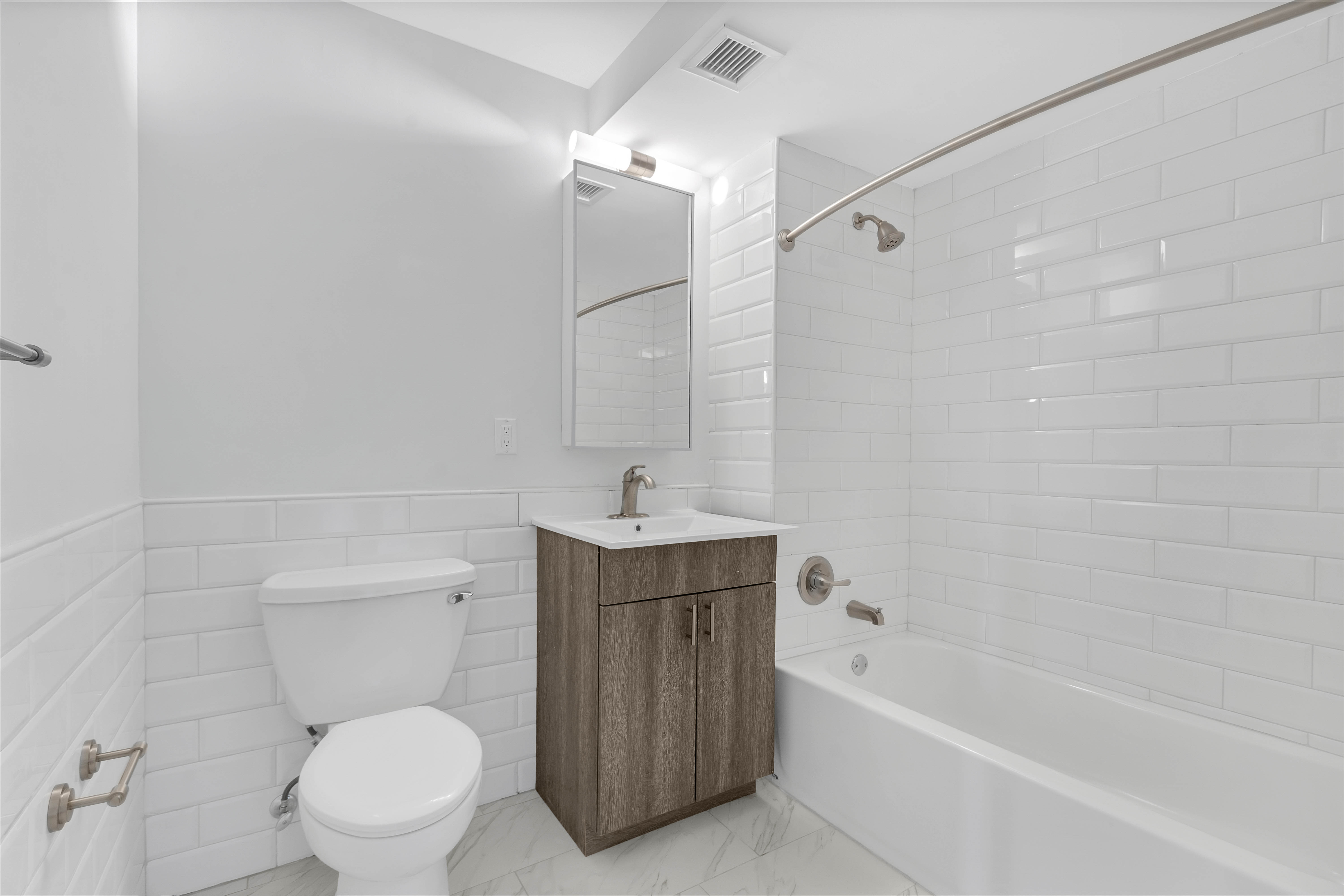 142 Richards Street, Unit 2E Brooklyn, NY 11231 - Photo 5 of 7 a bathroom with a sink a toilet and shower
