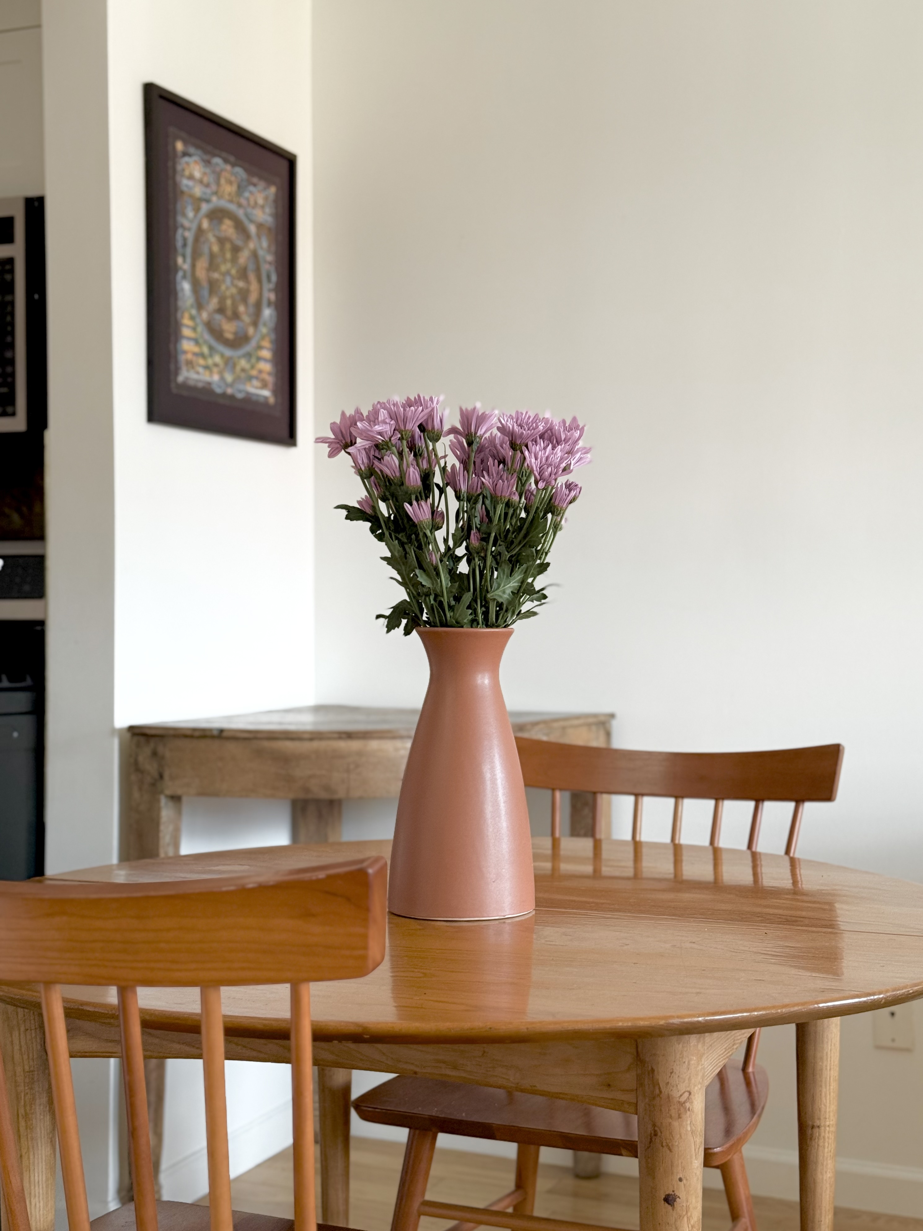394 12th Street, Unit 5 Brooklyn, NY 11215 - Photo 5 of 14 a view of a dining room with furniture and a potted plant