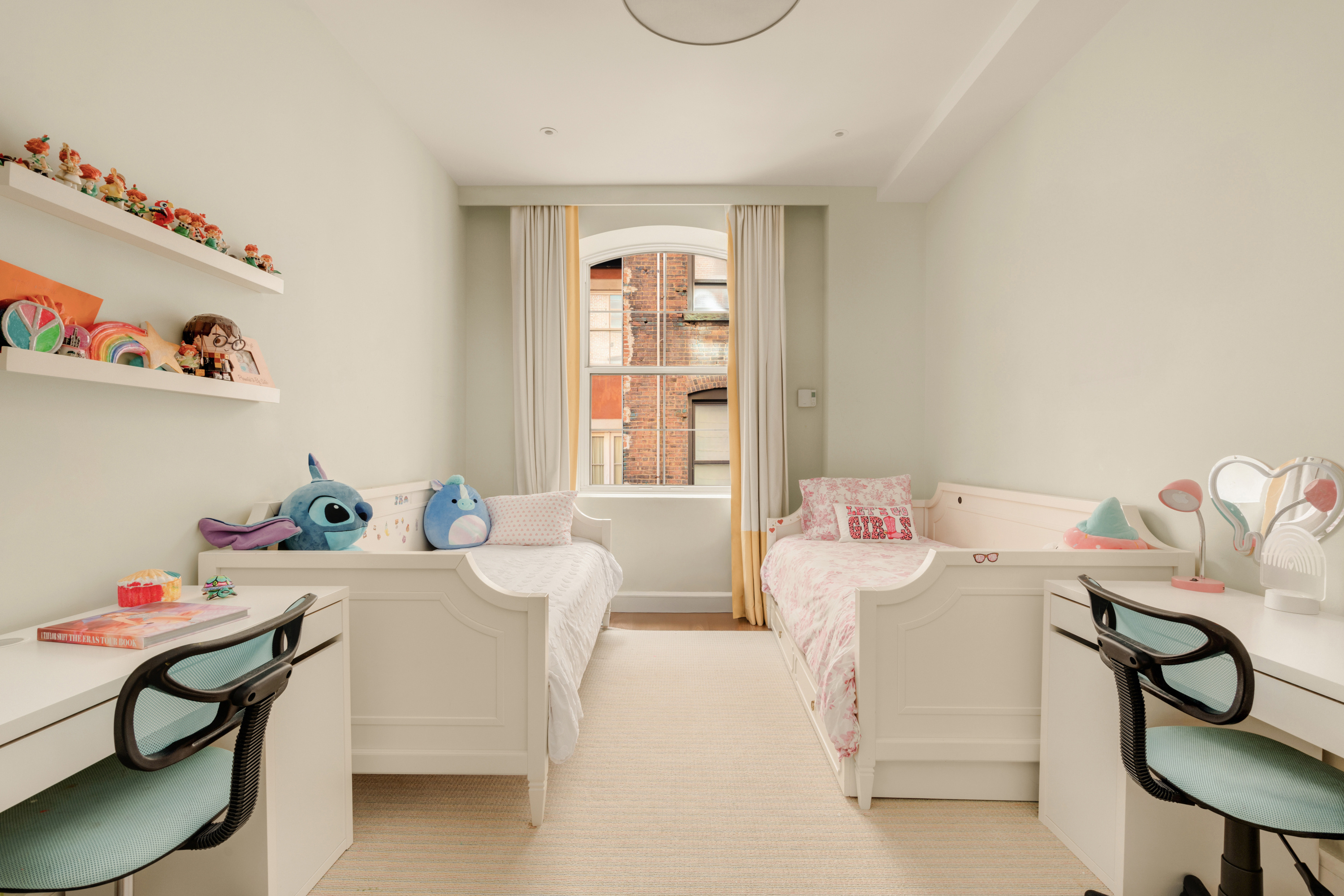 60 Beach Street, Unit 3C Manhattan, NY 10013 - Photo 7 of 12 a living room with furniture a baby crib and a table