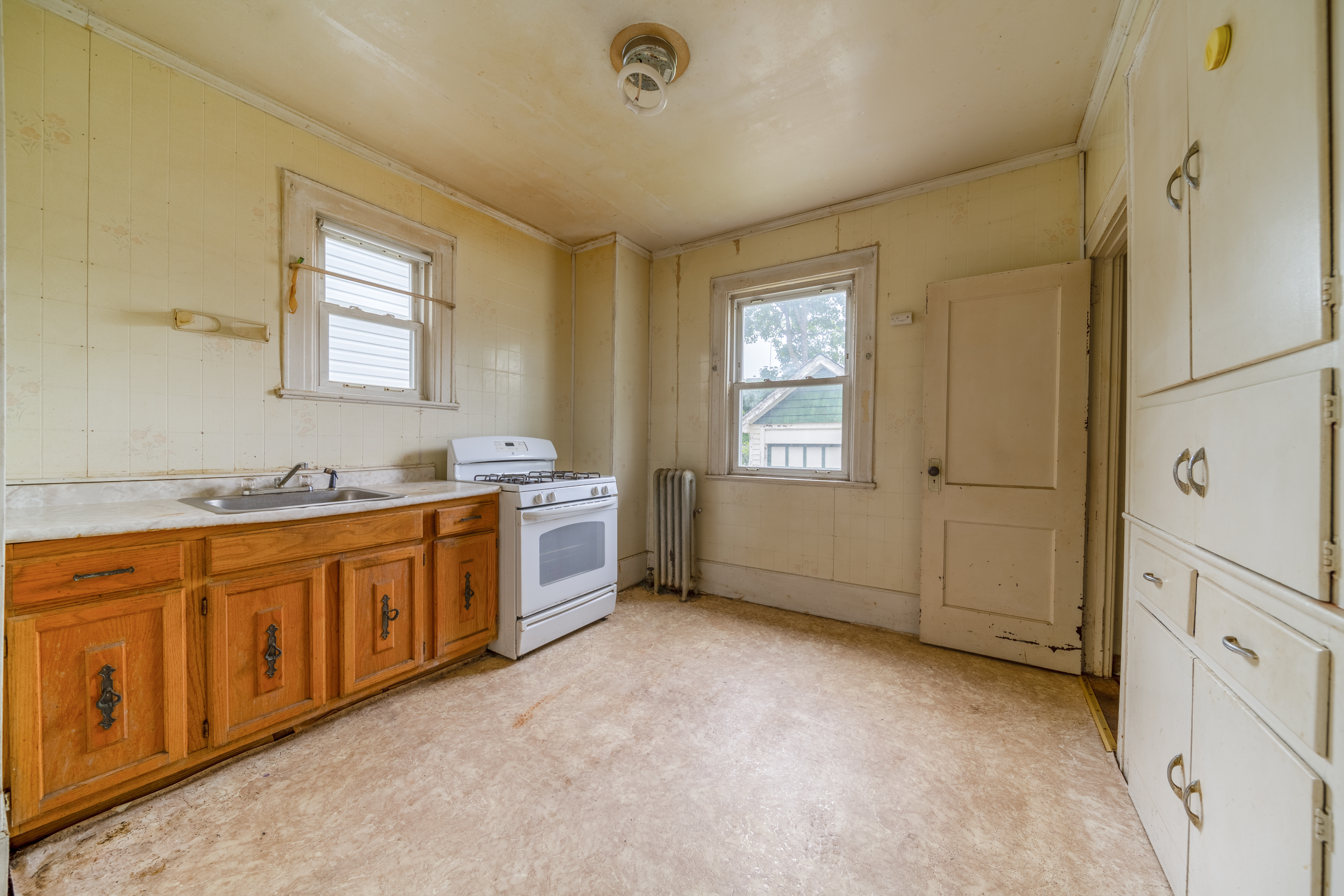 100-30 198th Street Queens, NY 11423 - Photo 8 of 15 a spacious bathroom with a granite countertop sink and a bathtub