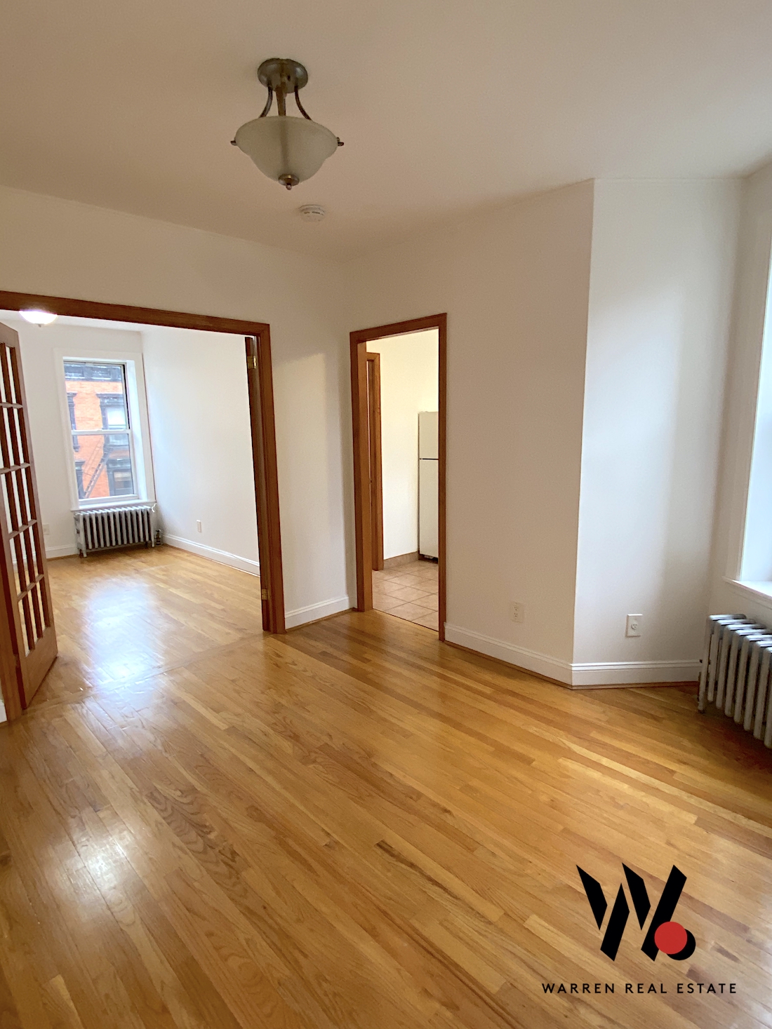 80 East 7th Street, Unit 4D Manhattan, NY 10003 - Photo 2 of 8 a view of an empty room and window