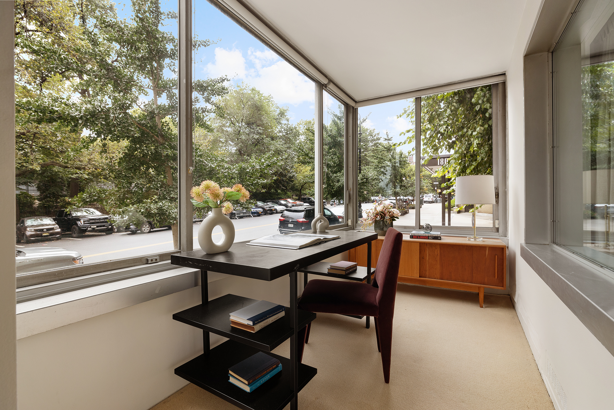 180 East End Avenue, Unit 1C Manhattan, NY 10128 - Photo 12 of 19 a view of a dining room with furniture window and outside view