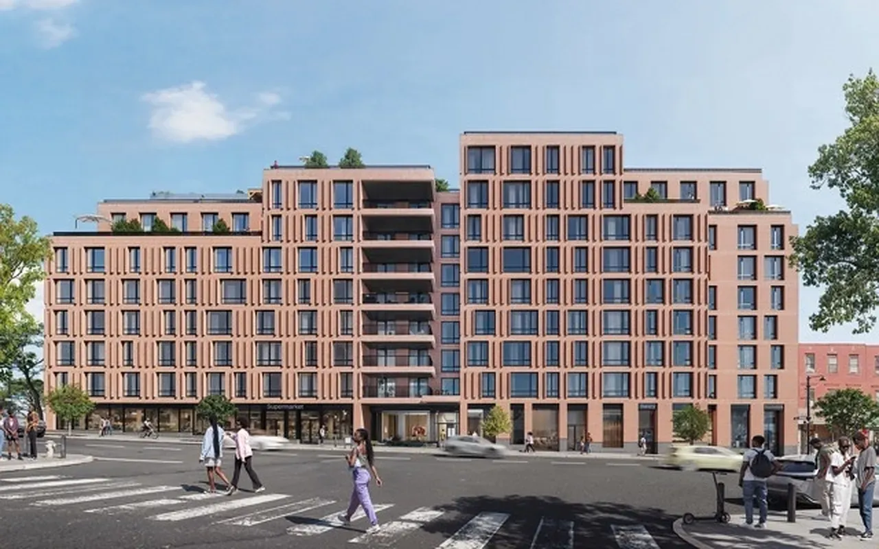 a front view of a building with a street