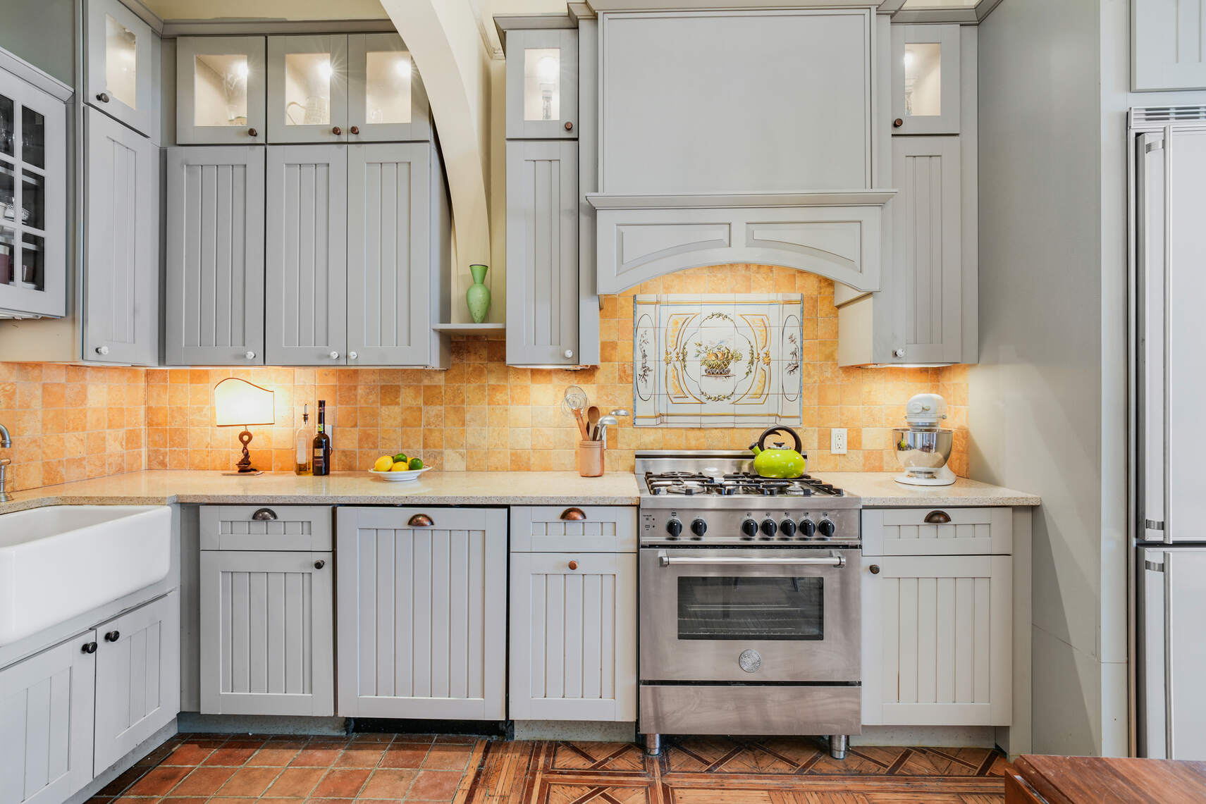 132 Joralemon Street, Unit 3BC Brooklyn, NY 11201 - Photo 6 of 16 a kitchen with granite countertop a stove a sink and a window