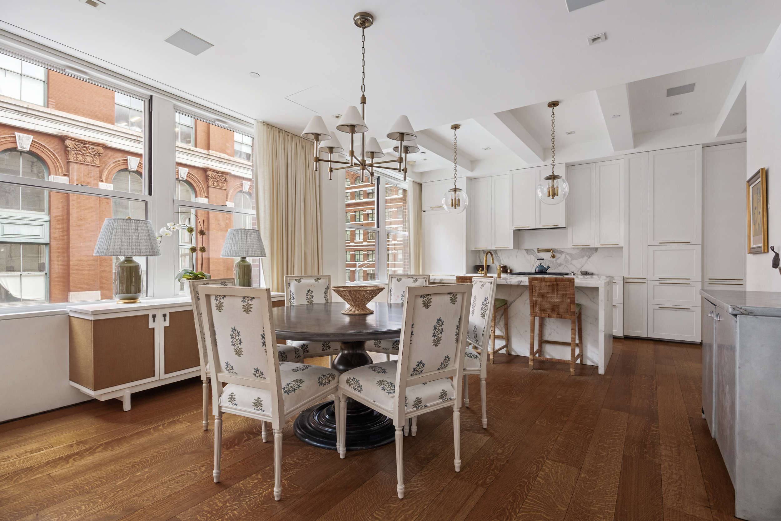 5 Harrison Street, Unit 3 Manhattan, NY 10013 - Photo 4 of 14 a view of a dining room with furniture window and wooden floor