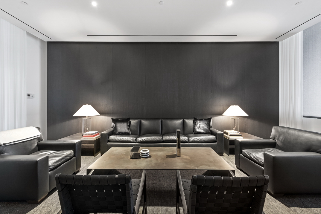 11 North Moore Street, Unit 2B Manhattan, NY 10013 - Photo 10 of 12 a living room with furniture a lamp and a lamp