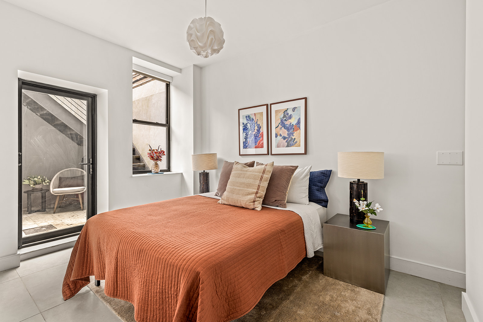 516 Classon Avenue, Unit 1B Brooklyn, NY 11238 - Photo 13 of 17 a bedroom with bed and a window