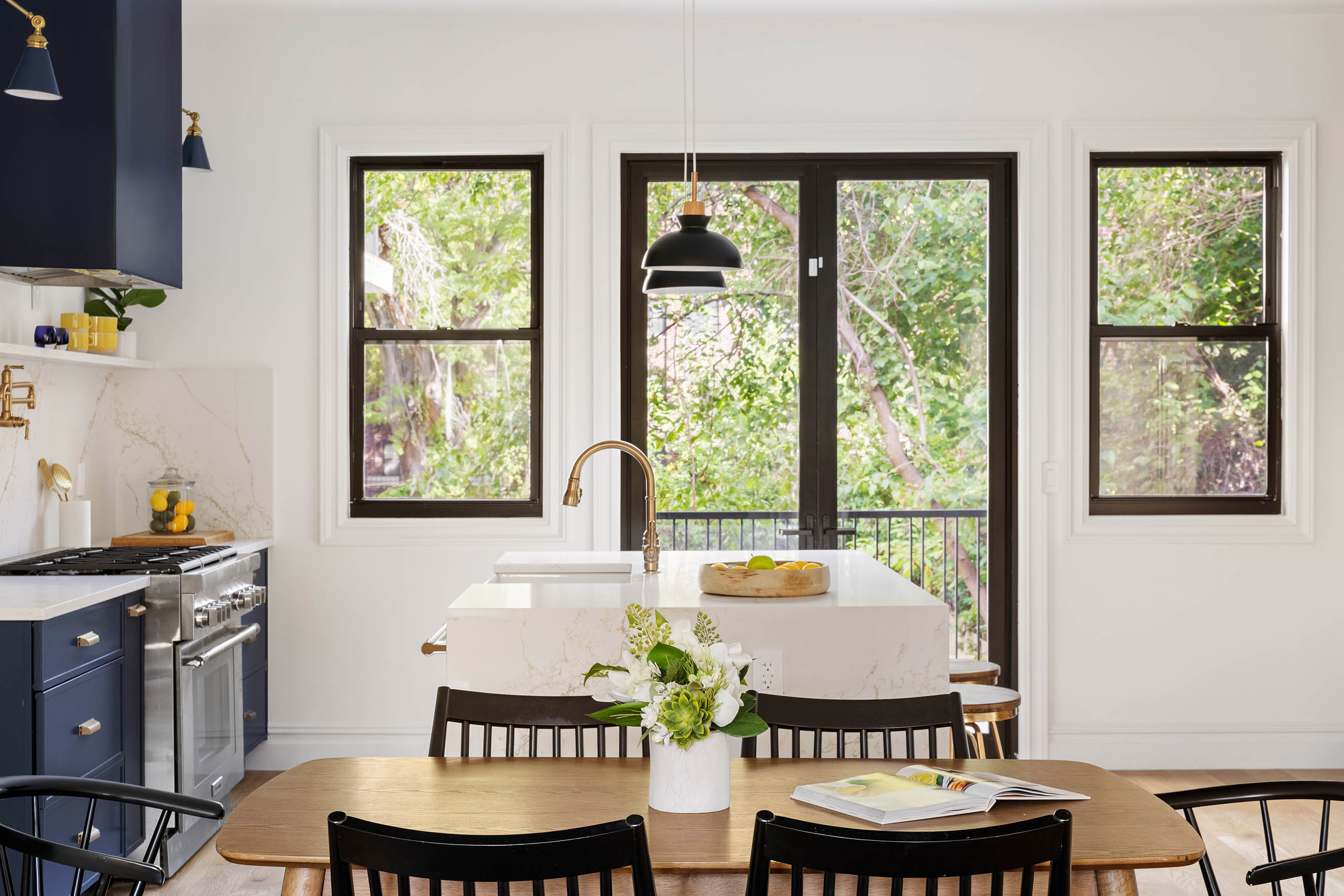 749 Monroe Street Brooklyn, NY 11221 - Photo 3 of 14 a dining room with furniture a window and wooden floor