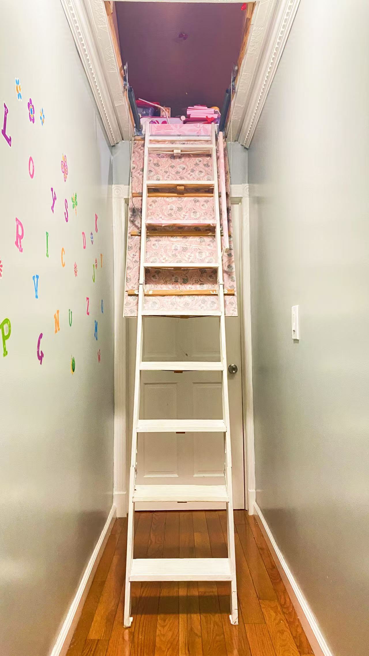 10-12 Church Street Queens, NY 11414 - Photo 9 of 16 a view of walk in closet with empty racks