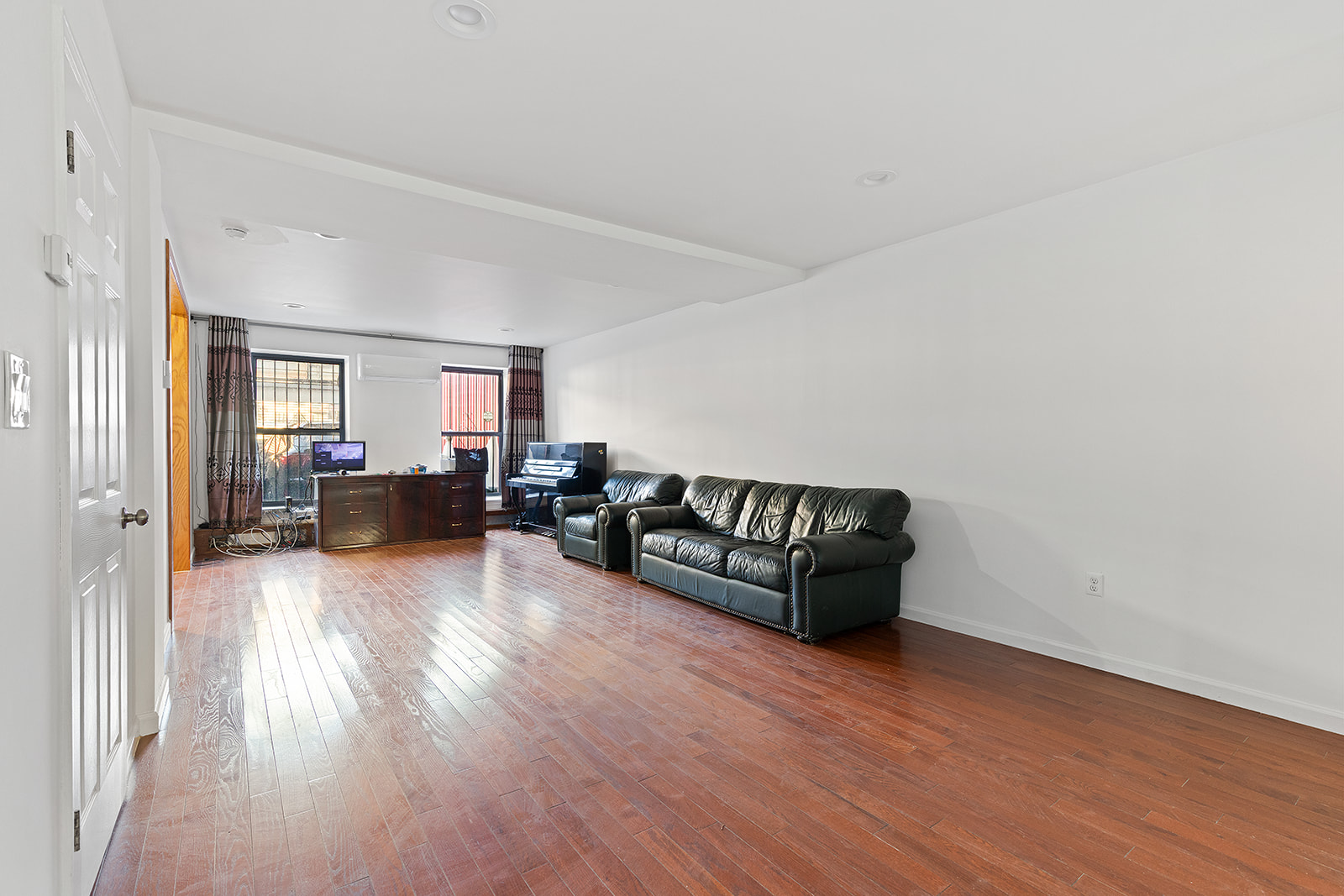 1644 Atlantic Avenue Brooklyn, NY 11213 - Photo 4 of 17 a living room with furniture and wooden floor