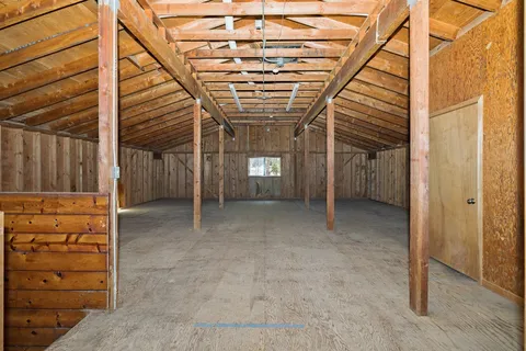 a view of a room with furniture