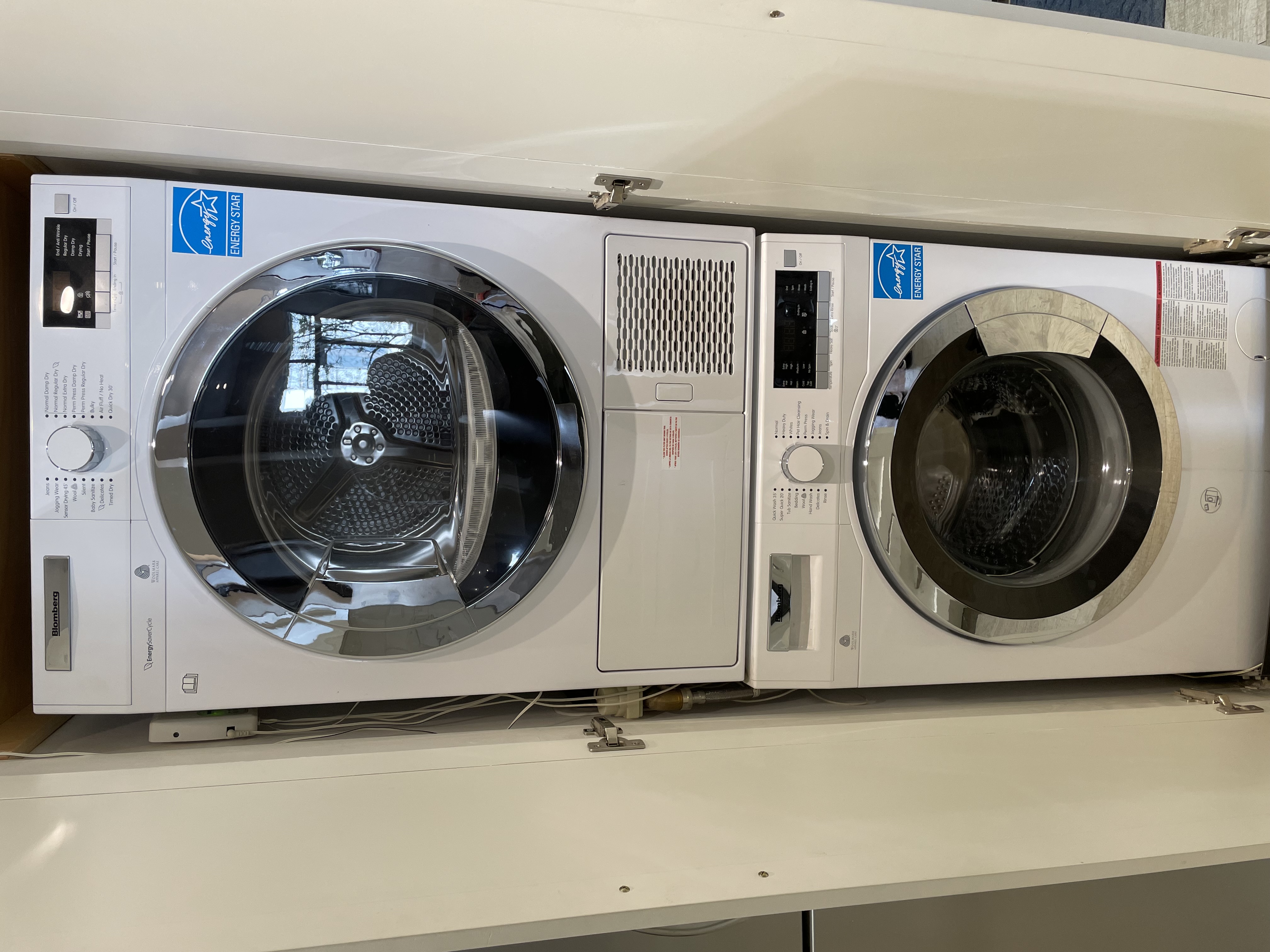 23 East 10th Street, Unit 3C Manhattan, NY 10003 - Photo 9 of 15 a utility room with dryer and washer