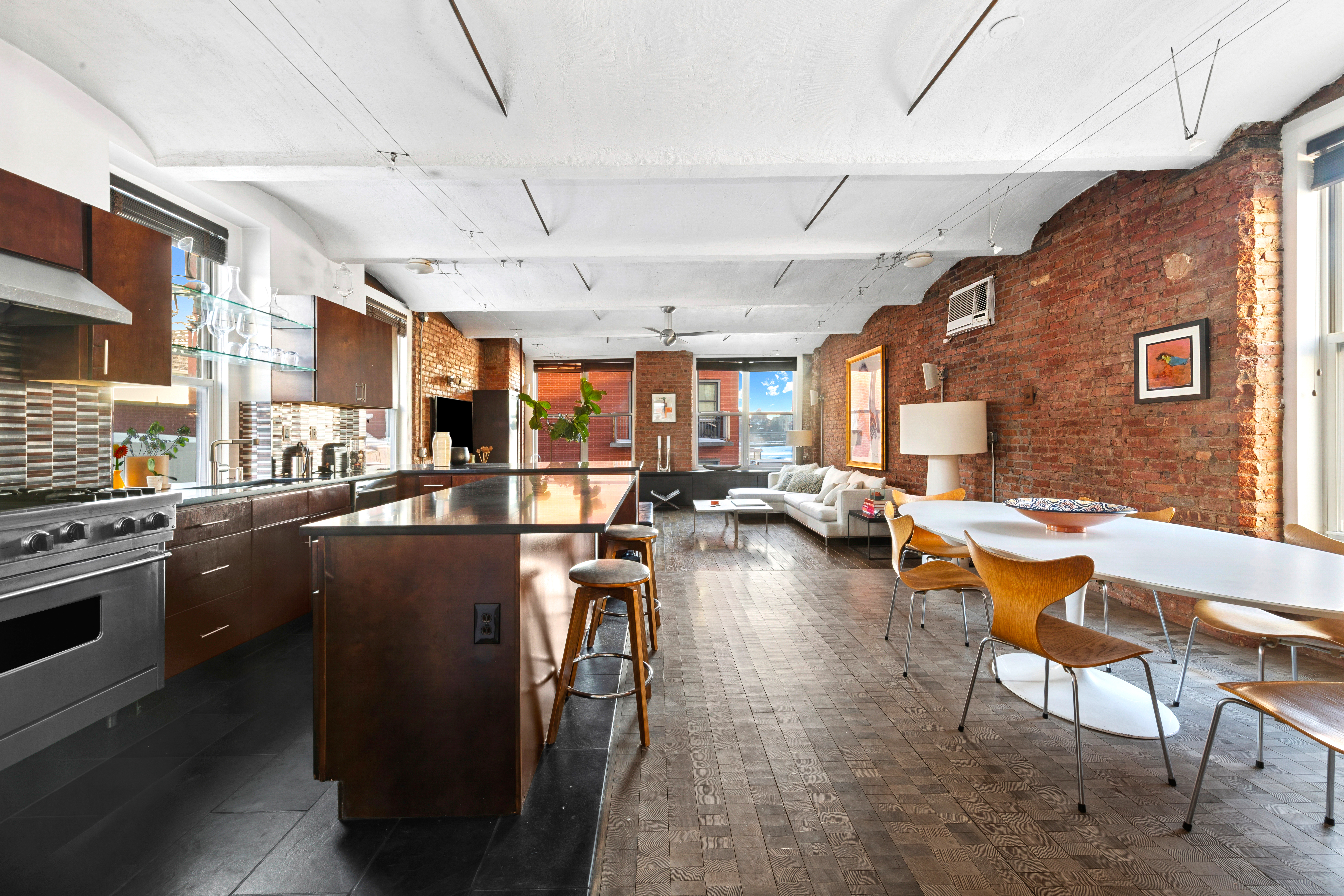 275 Water Street, Unit 5/6 New York, NY 10038 - Photo 3 of 26 a kitchen with lots of counter top space and stainless steel appliances