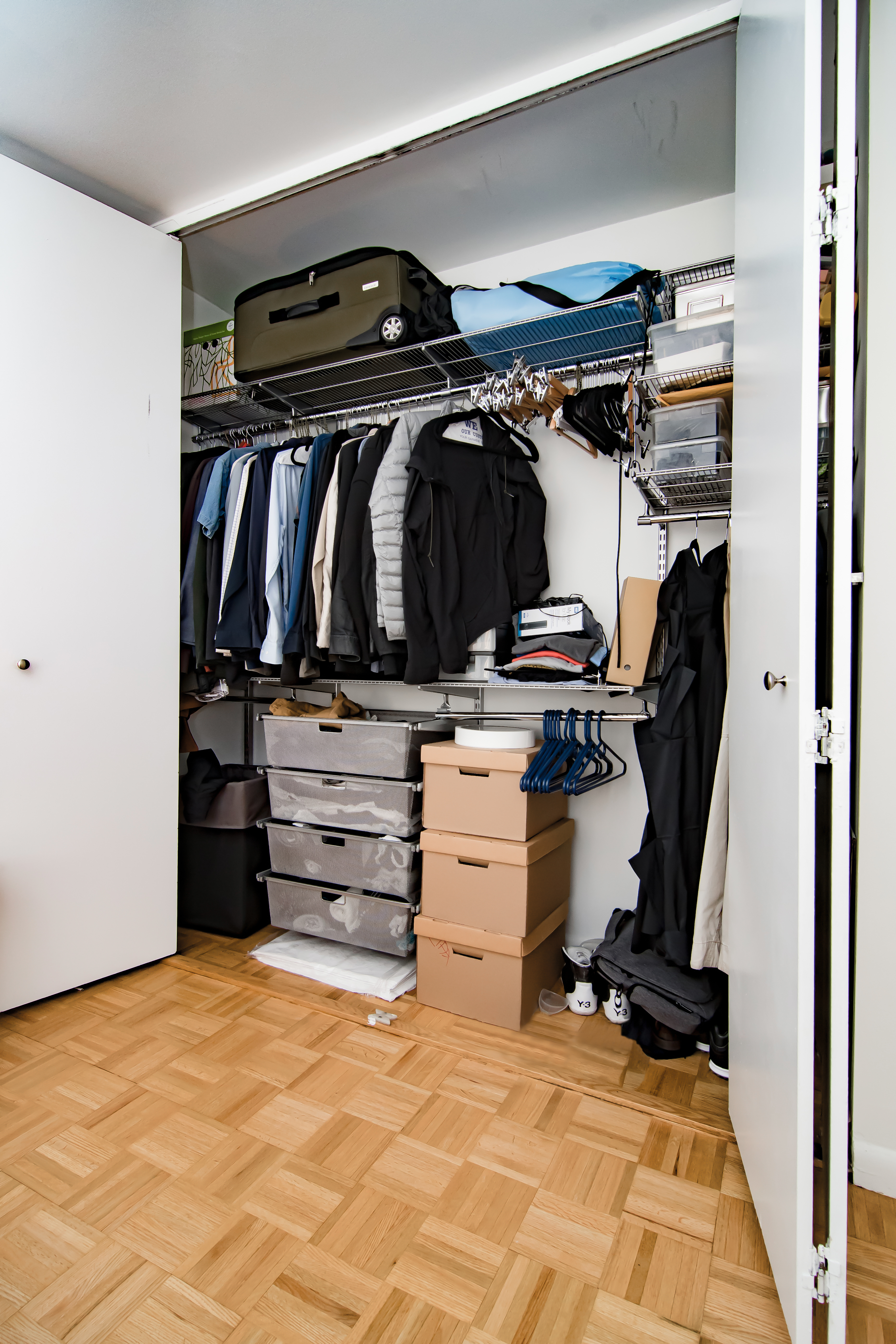 2250 Broadway, Unit 6J Manhattan, NY 10024 - Photo 5 of 10 a view of walk in closet with clothes and shoes