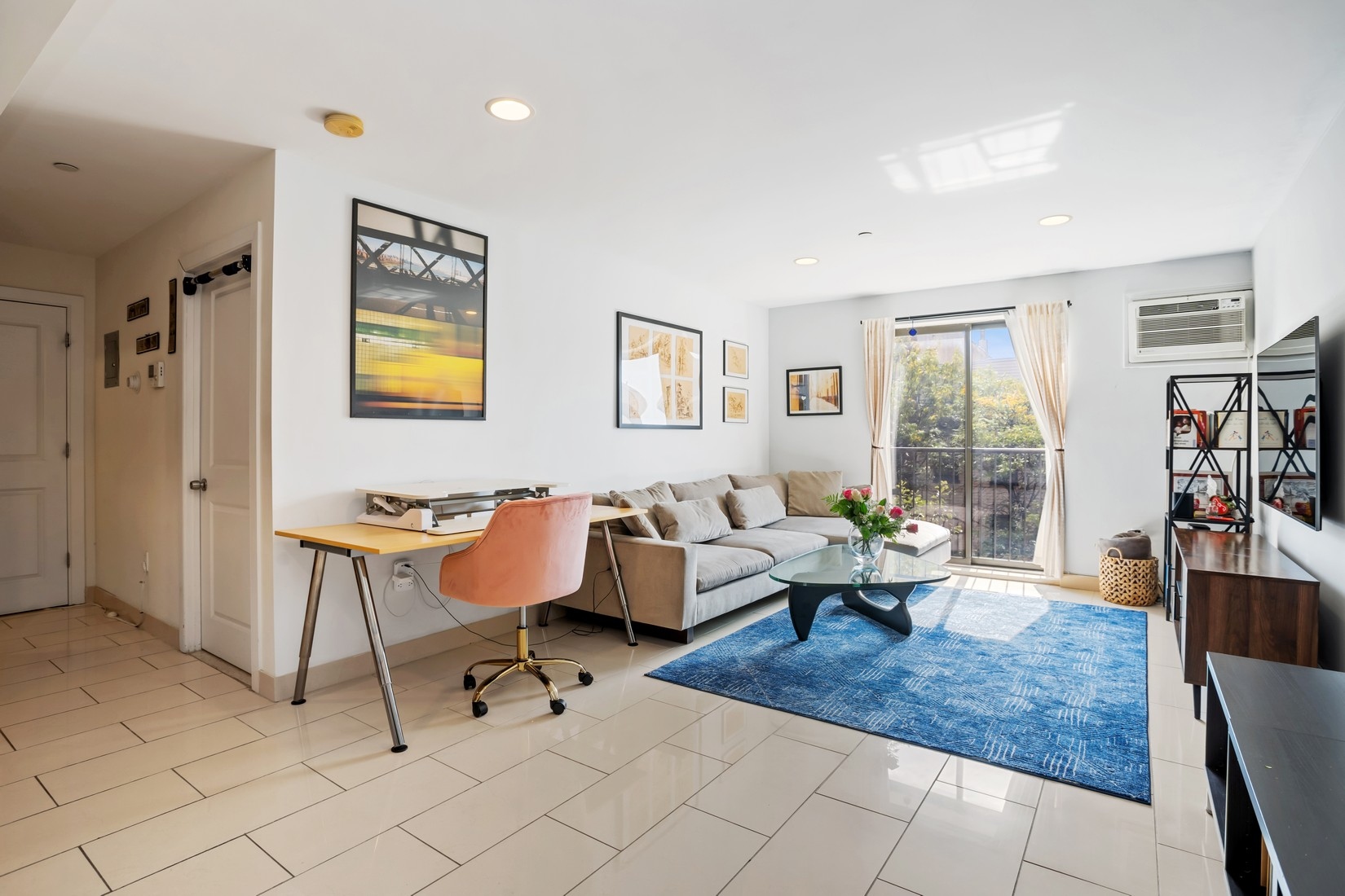 201 Huron Street, Unit 4F Brooklyn, NY 11222 - Photo 2 of 12 a living room with furniture and a table