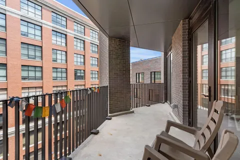 a view of a building from a balcony