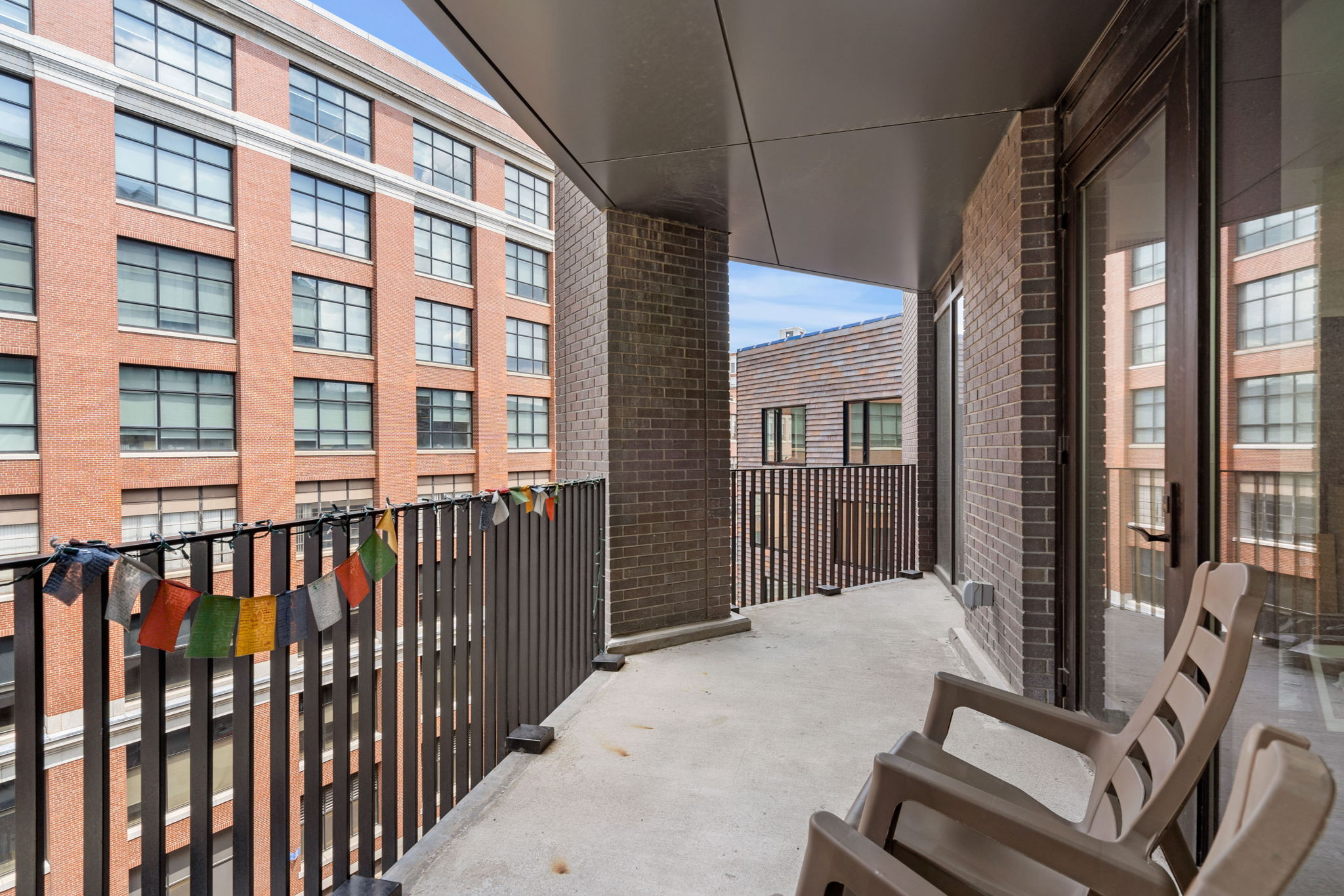 14 West Broadway, Unit 601 South Boston, MA 02127 - Photo 16 of 20 a view of a building from a balcony