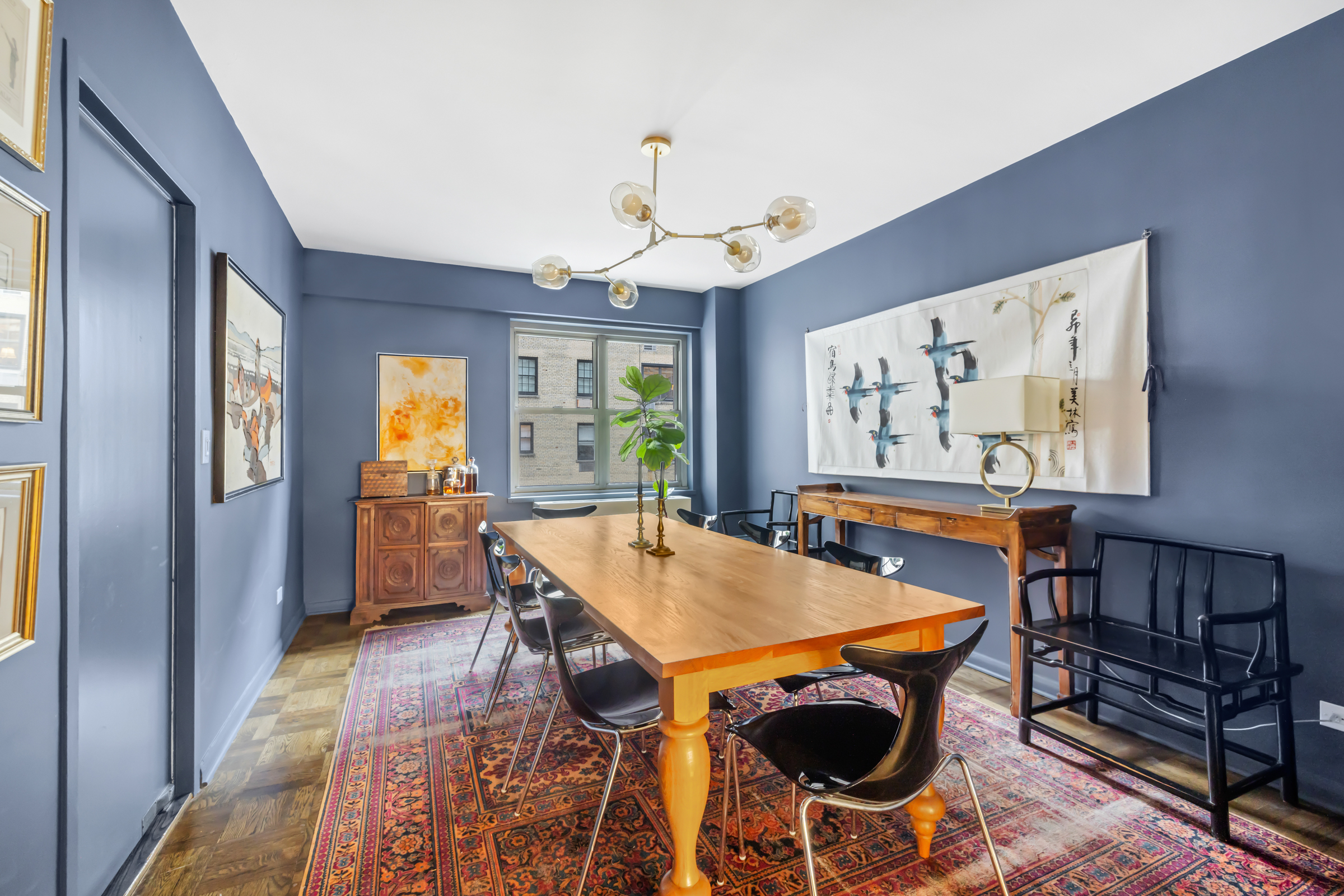16 Sutton Place, Unit 11A Manhattan, NY 10022 - Photo 4 of 19 a view of a dining room with furniture window and wooden floor