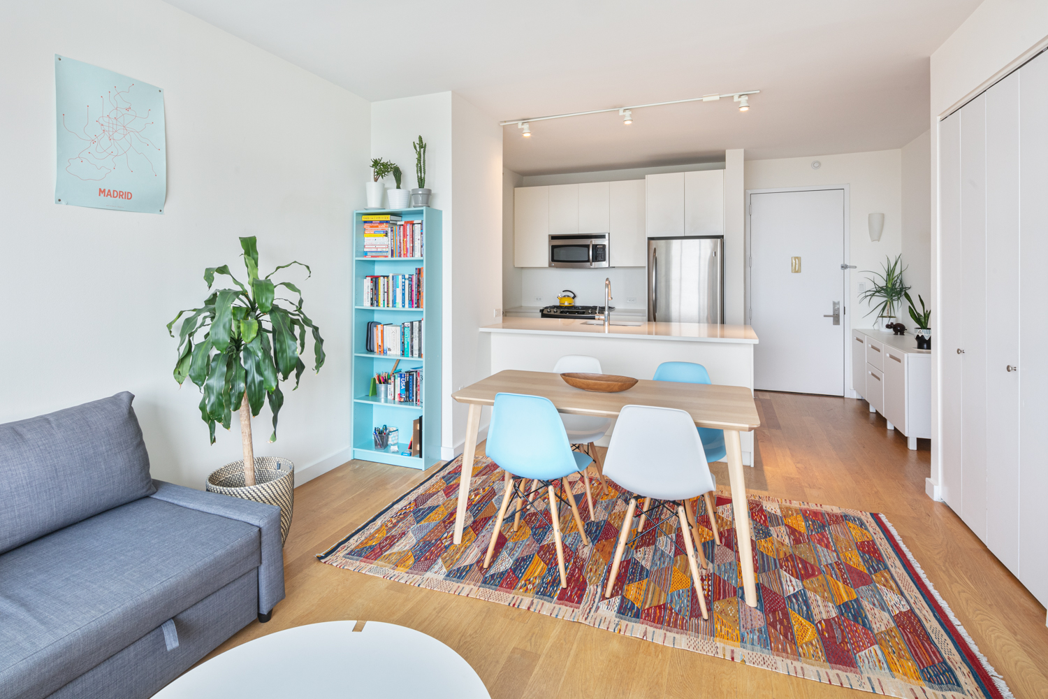 189 Schermerhorn Street, Unit 24D Brooklyn, NY 11201 - Photo 2 of 10 a living room with furniture dining table and wooden floor