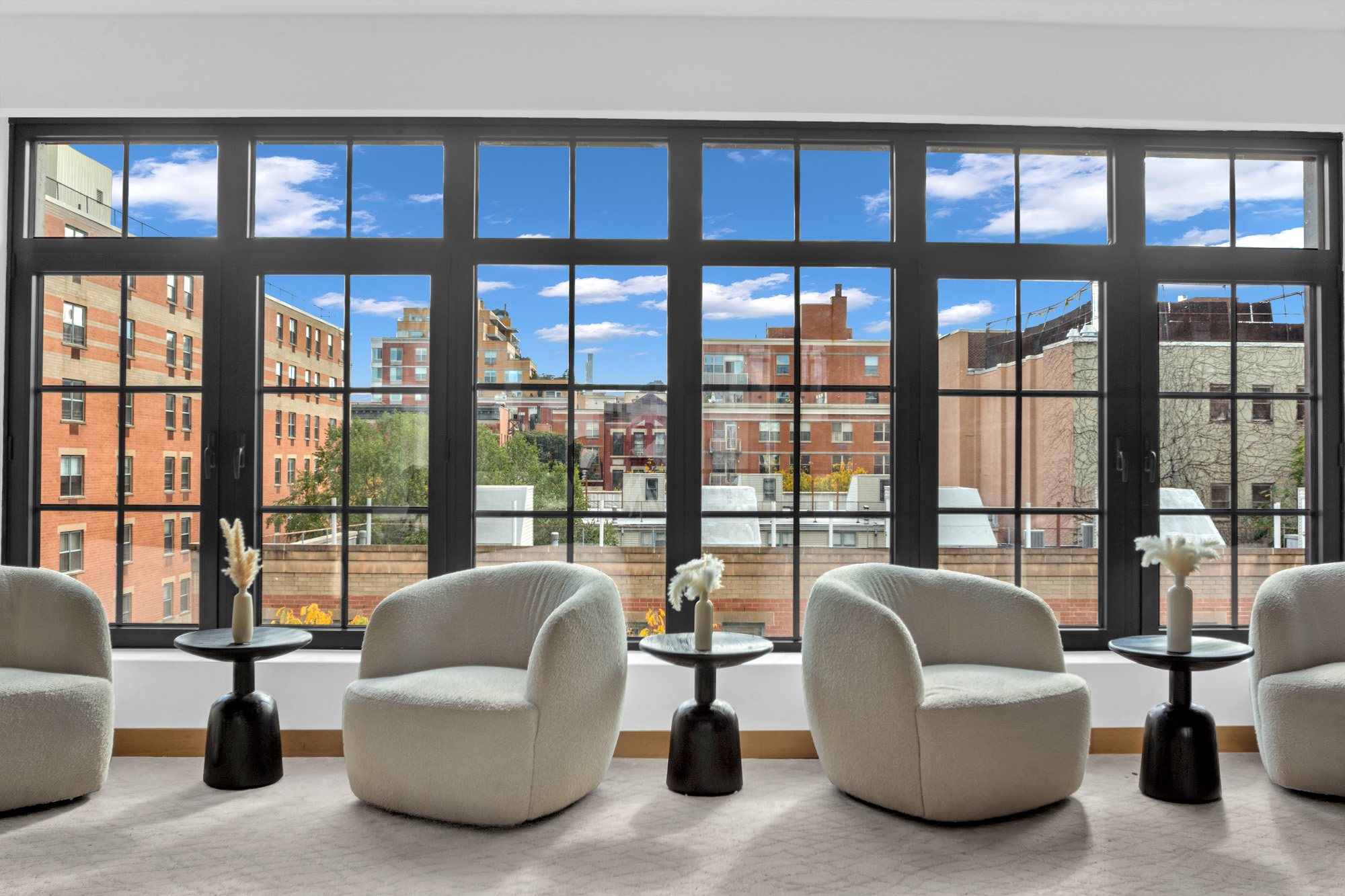 300 West 122nd Street, Unit 6R Manhattan, NY 10027 - Photo 14 of 23 a living room with furniture and a large window