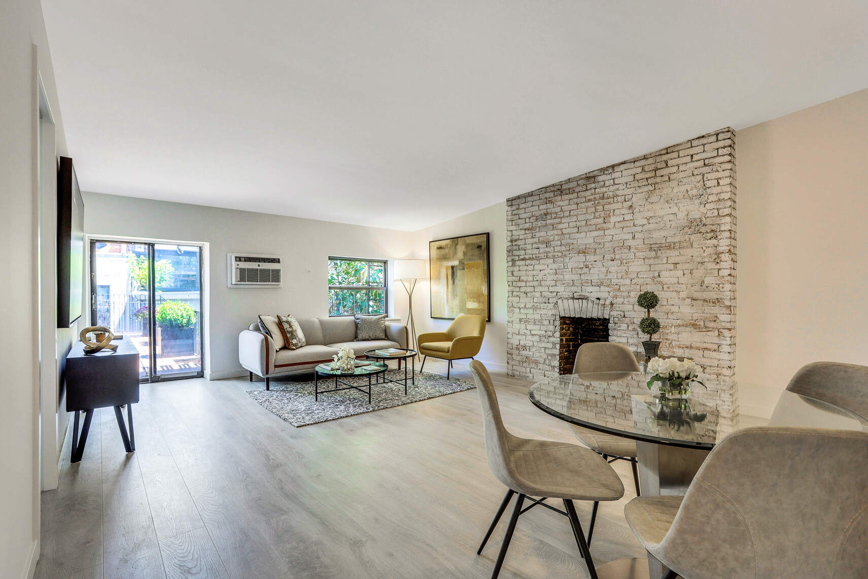 237 East 17th Street, Unit 520 Manhattan, NY 10003 - Photo 3 of 14 a living room with furniture and a fireplace
