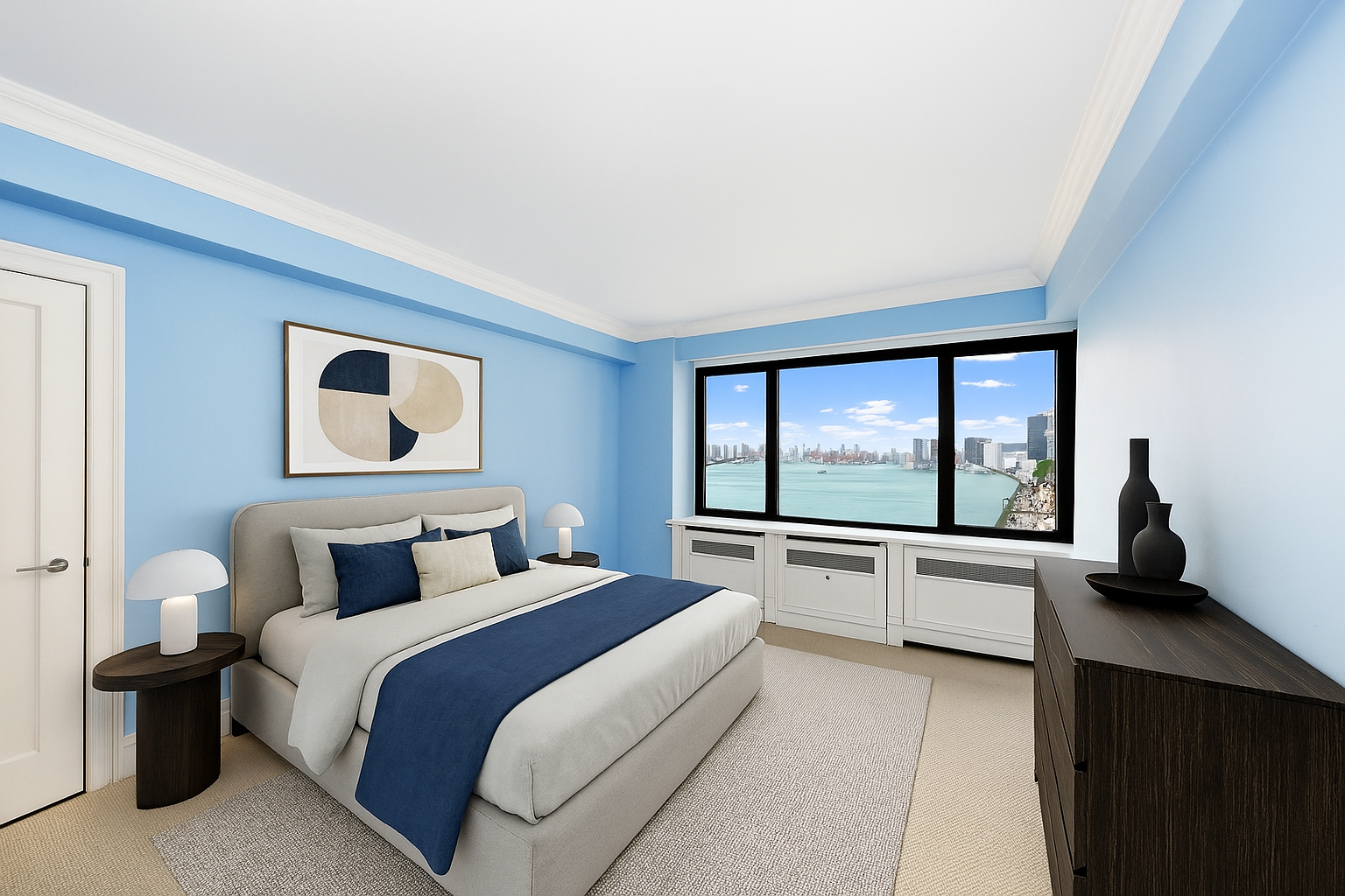 45 Sutton Place South, Unit 8L Manhattan, NY 10022 - Photo 12 of 22 a bedroom with a large bed and a large window