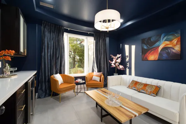 a bathroom with a tub sink and window