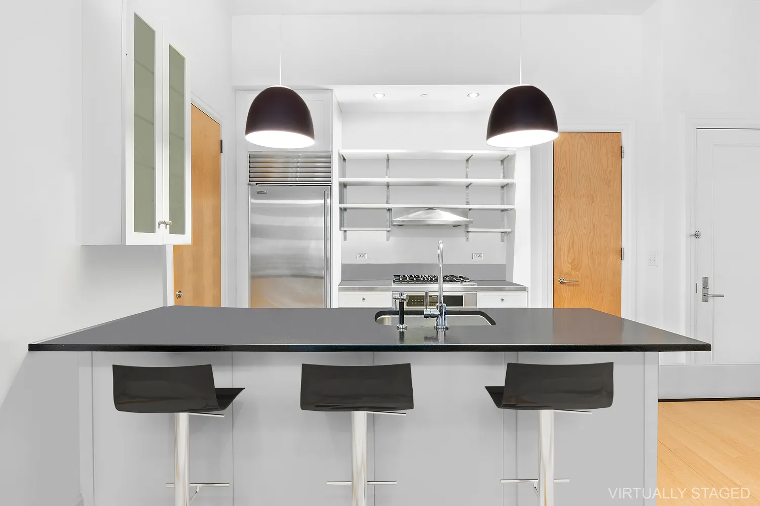 a view of a kitchen counter space and window