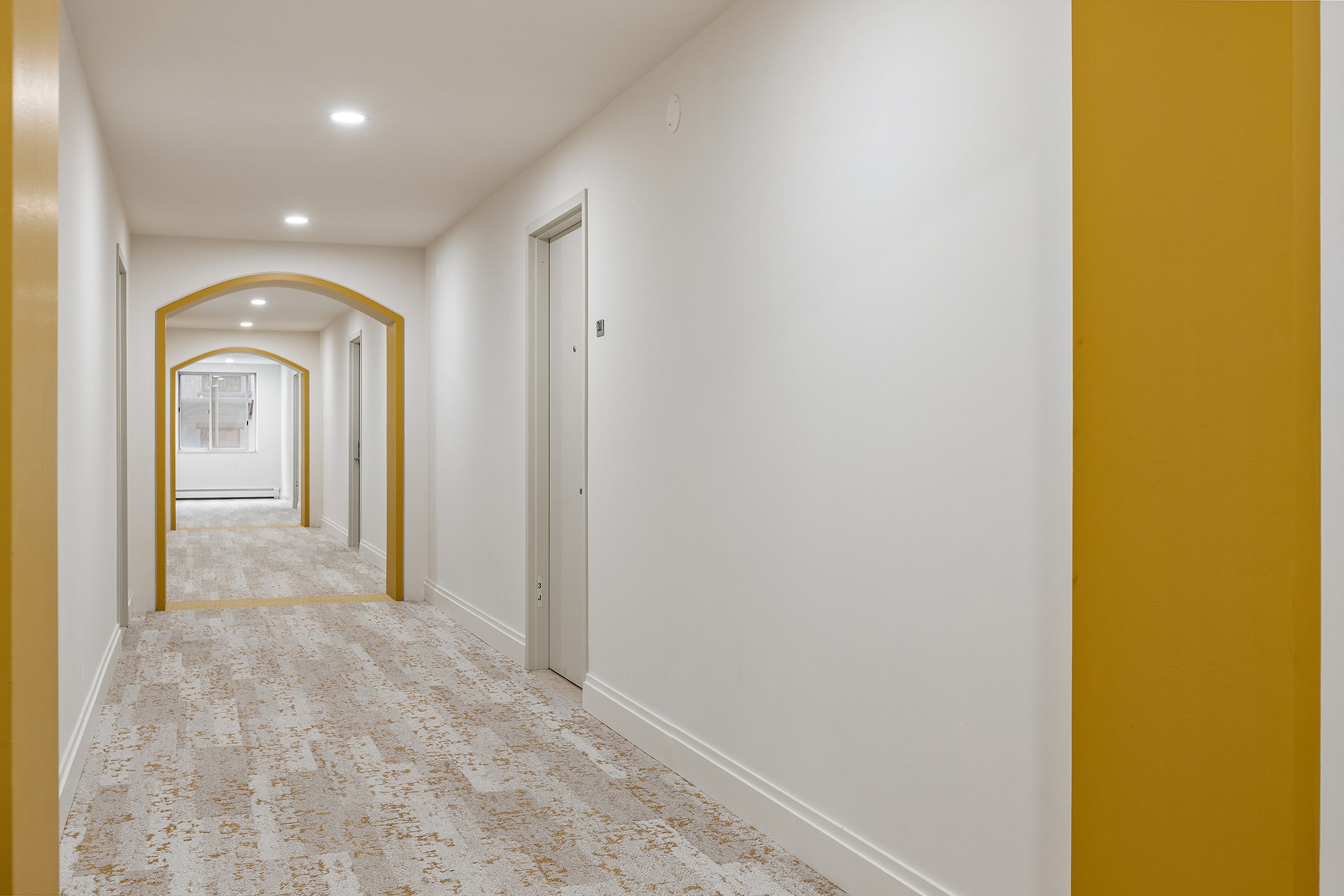 194 East 2nd Street, Unit 4A Manhattan, NY 10009 - Photo 13 of 13 a view of a hallway with wooden floor