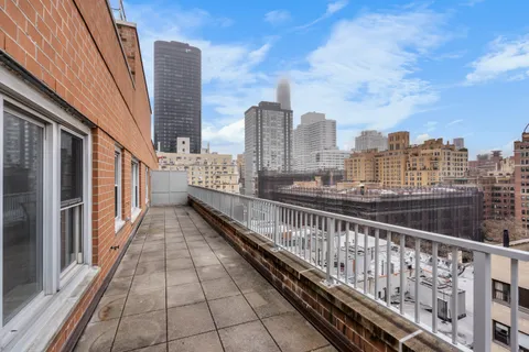 a view of city with balcony